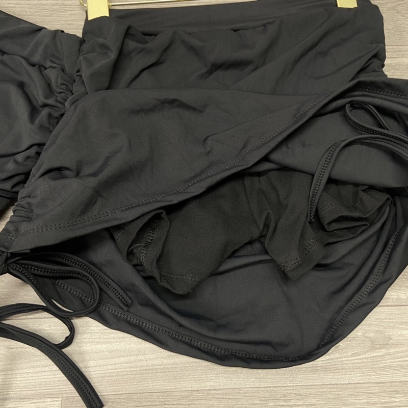 Chân váy dây rút hông chất dãn Váy dây rút 2 bên màu đen có quần lót trong