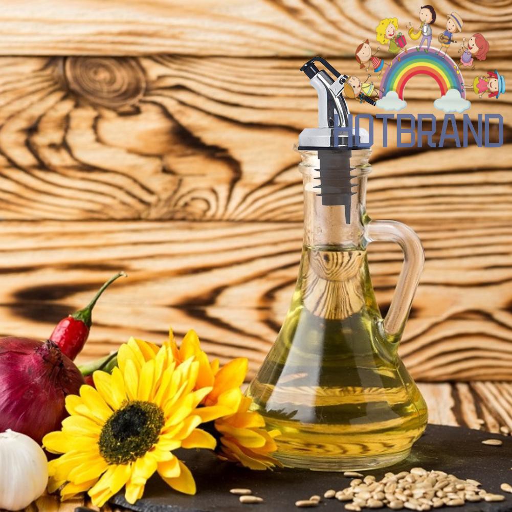 Nút đậy chai bằng nhựa có vòi rót chống rò rỉ dùng cho chai dầu ăn/rượu