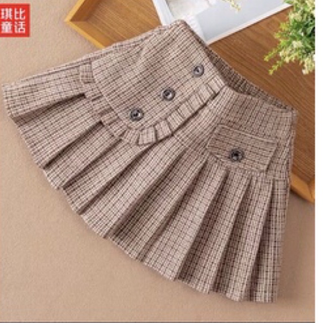 Chân váy xếp  ly bé gái đáp bèo 3 cúc cv014