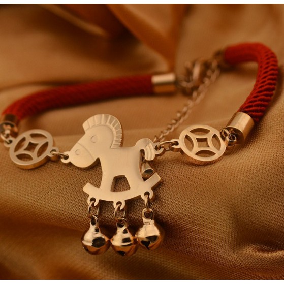 Lắc tay chỉ đỏ titan con ngựa vàng 14k