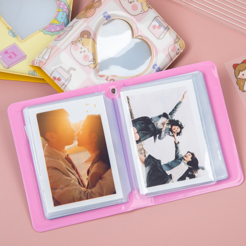 Album Đựng Ảnh 40 Ngăn 3 Inch Hình Trái Tim Hoạt Hình