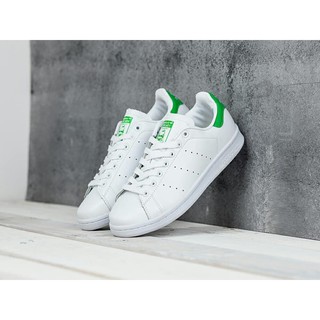 Giày sneaker trắng gót xanh lá