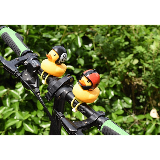 Vịt đội mũ bảo hiểm có đèn Led và Còi gắn xe đạp cho bé