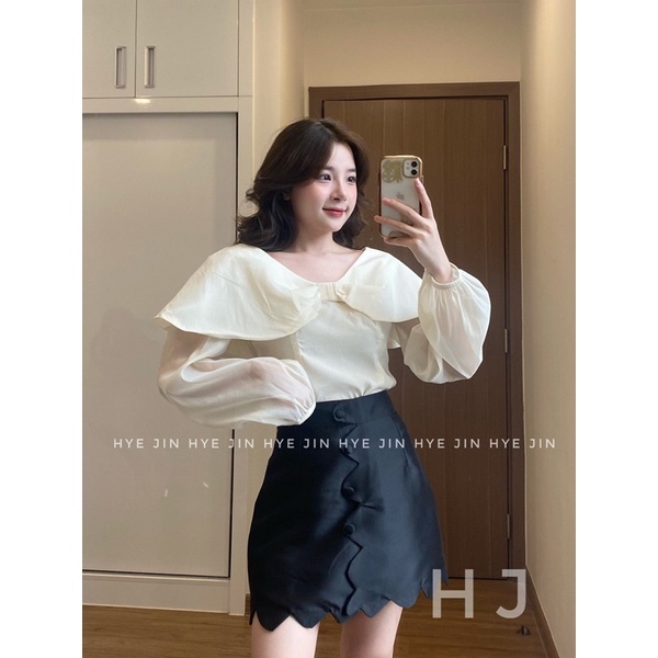 Áo sơ mi tay bồng nơ bánh bèo mix chân váy tafta lượn sóng