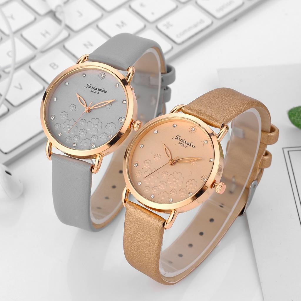 Đồng hồ Quartz nữ mặt dập nổi hoa đính đá dây da