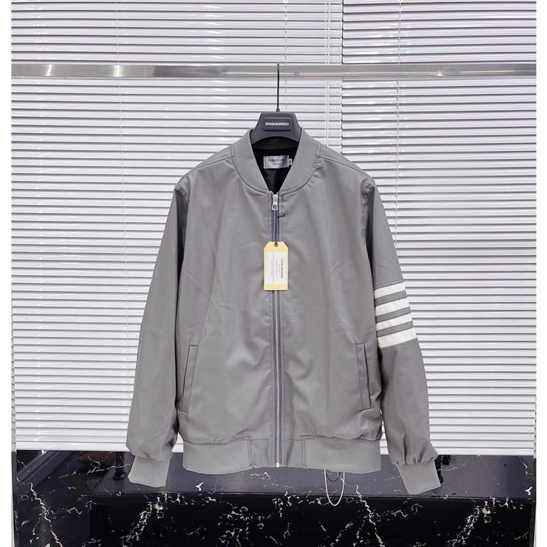 Áo khoác da nam Thom Browne bomber jacket thêu 4 sọc trắng tay lót gió bo chun dày dặn sang trọng