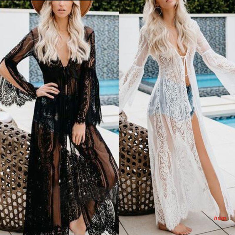 Áo khoác ren hoa xuyên thấu thiết kế tay loe dáng dài hợp thời trang đi biển phối với bikini