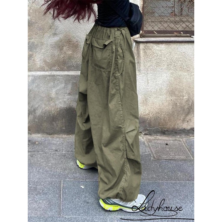 Quần ống rộng Lưng Thun Màu Trơn Có Túi Và Dây Cột Bên Hông Đơn Giản Cho Nữ