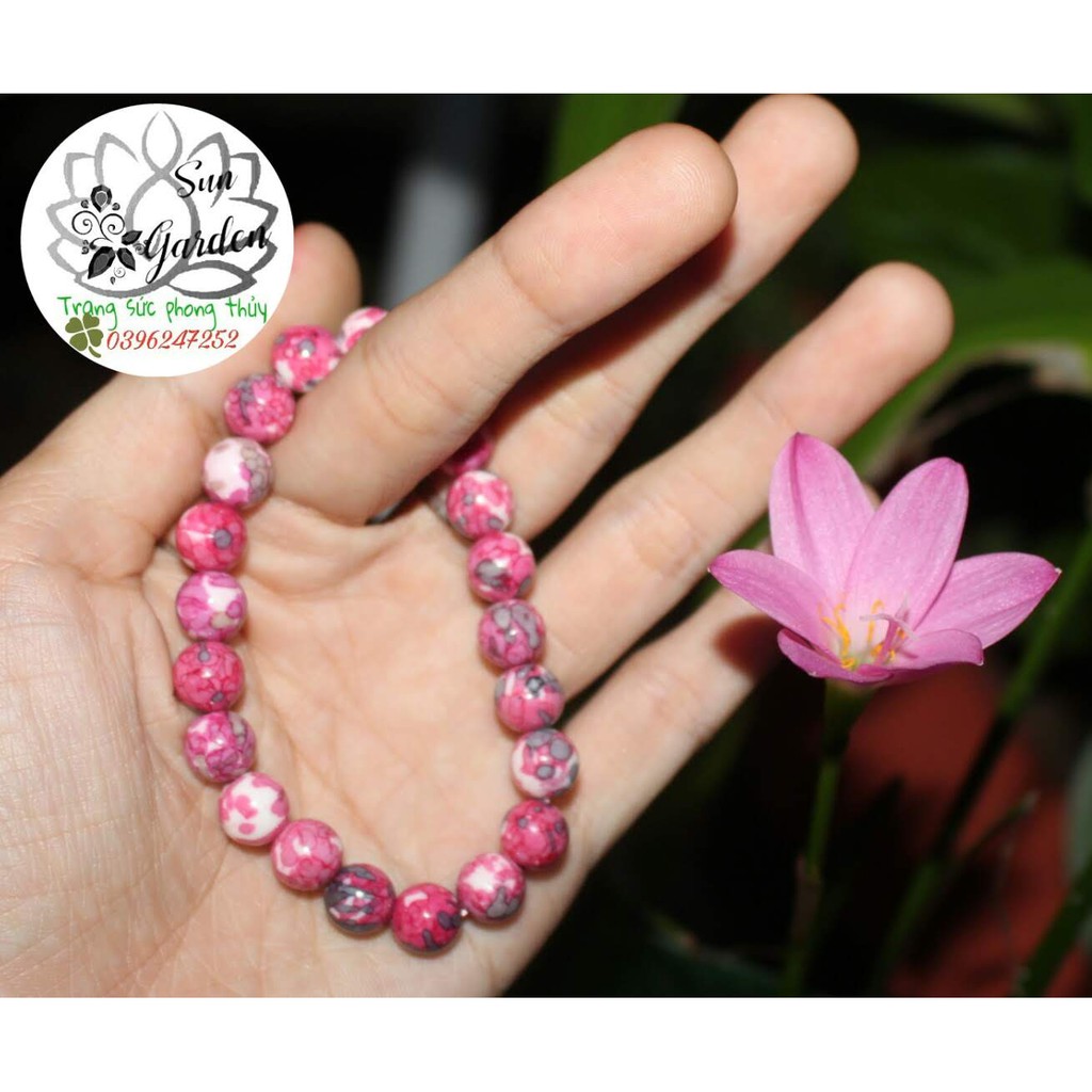 Vòng tay gỗ hóa thạch màu hoa đào 8ly