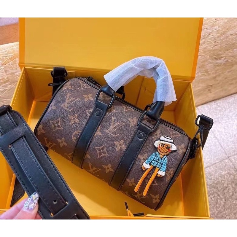 Túi đeo chéo lv trống mini