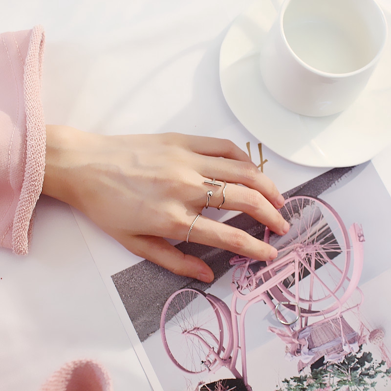 Bộ 4 nhẫn hợp kim mạ vàng/bạc kiểu dáng khác nhau cho nữ