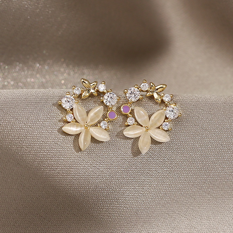 Đôi khuyên tai kim loại hình cánh hoa thời trang cho nữ