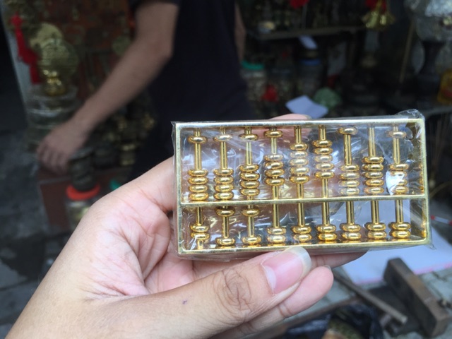 Bàn Tính Phong Thuỷ Buôn May Bán đắt