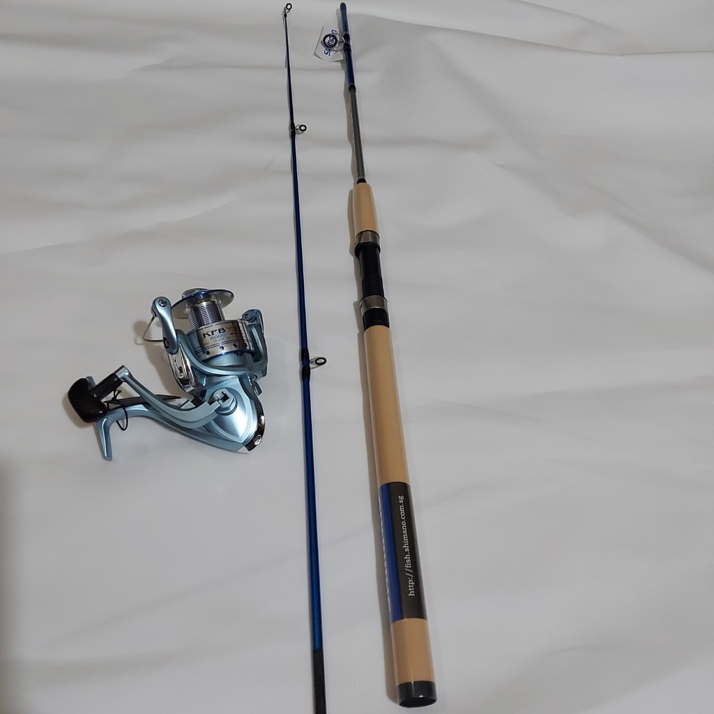 Bộ cần SHIMANO 2 KHÚC RỖNG CRUZAR VỚI MÁY YOLO KIM LOẠI