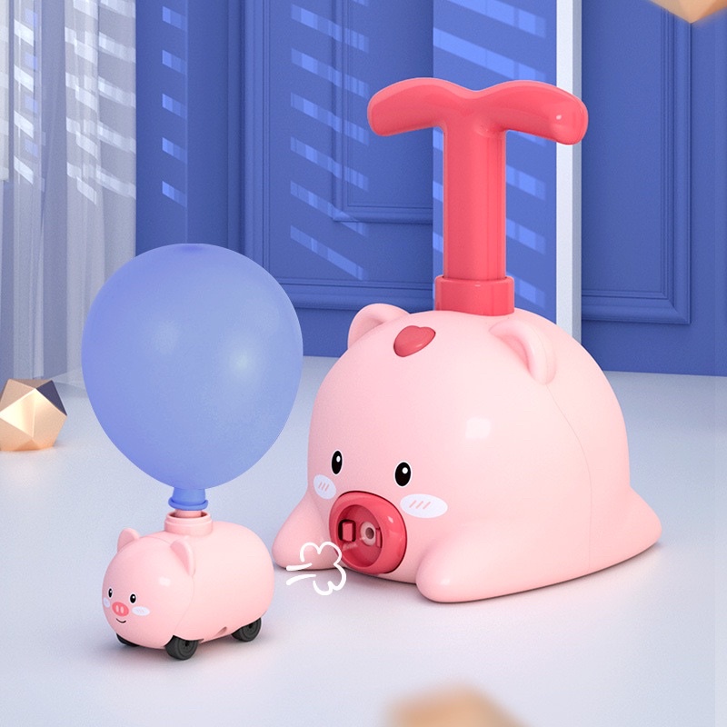 Đồ chơi ô tô con heo đất chạy bằng không khi dễ thương.
