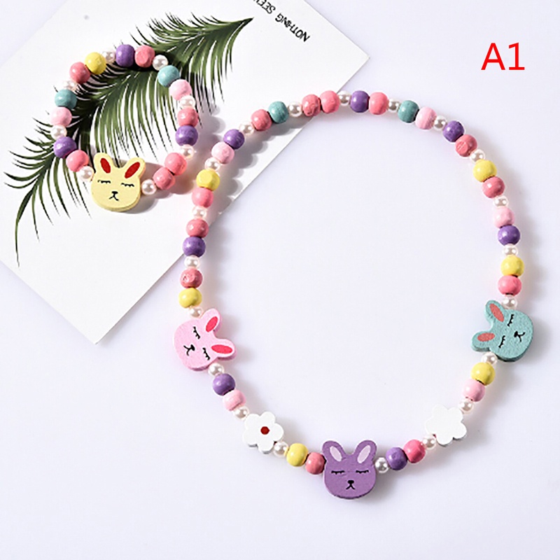 1 Bộ Vòng Cổ Chuỗi Hạt Gỗ Hình Hoạt Hình Dễ Thương Cho Bé Gái