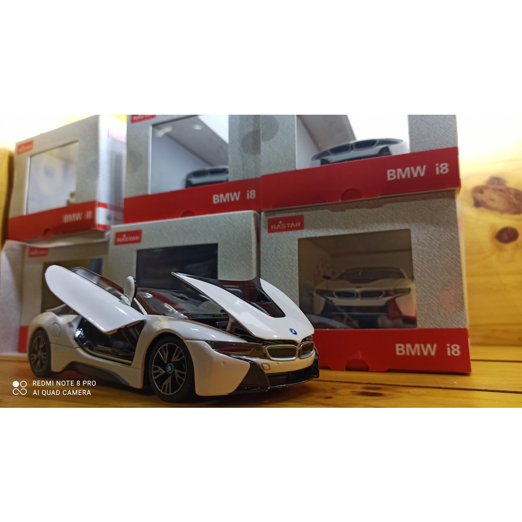 Mô hình xe ô tô siêu xe BMW I8 Hãng Rastar tỉ lệ 1:24 màu trắng, vỏ hợp kim, mở được cửa