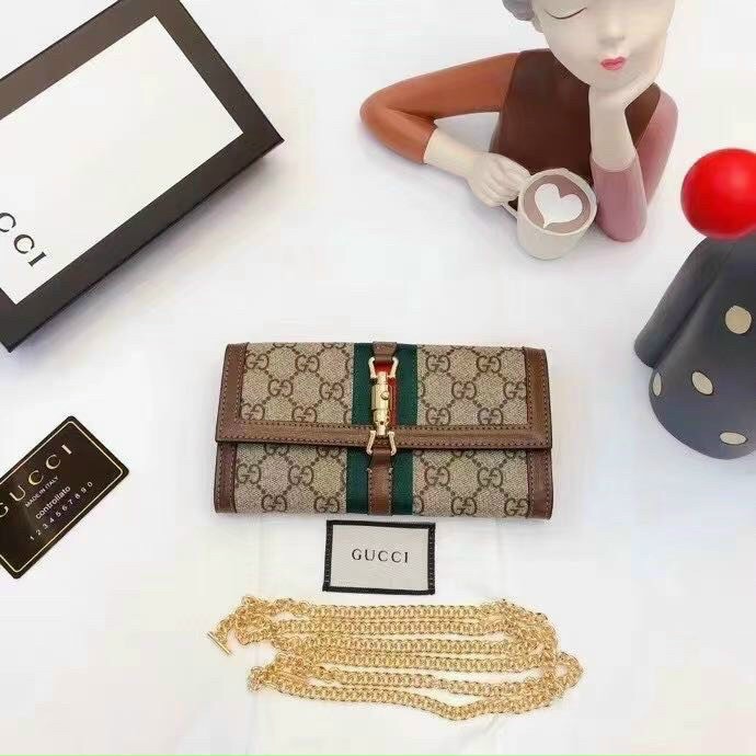 Ví cầm tay Gucci/Clutch cầm tay