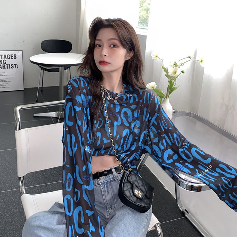 Áo thun tay dài dáng rộng họa tiết da báo cá tính cho nữ