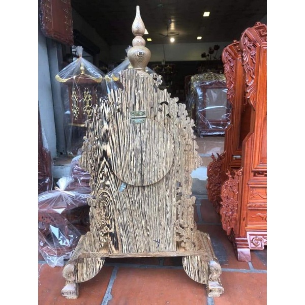 Đồng hồ để bàn gỗ mun đuôi công kích thước cao 80 cm ngang 48 cm sâu 20 cm hoạ tiết đục lân.