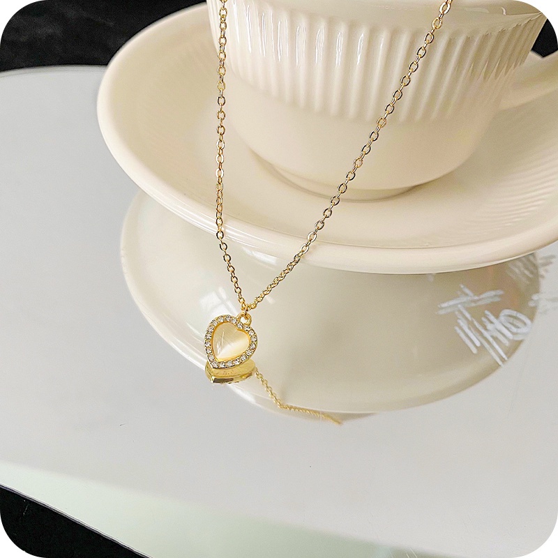 Dây chuyền mặt trái tim đính đá opal