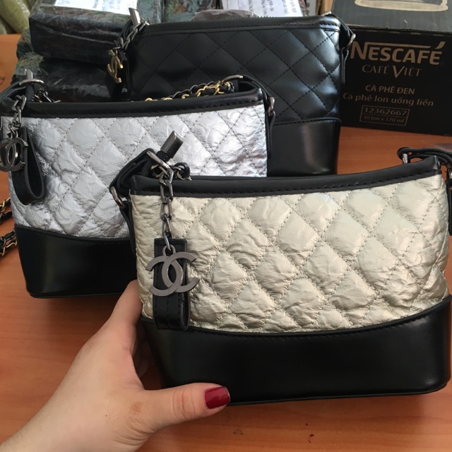 Túi đeo pha màu,da dập