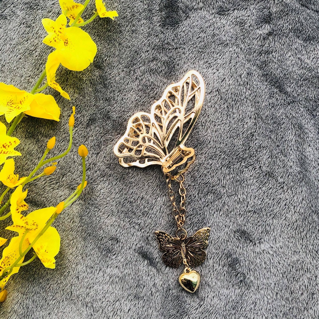 Kẹp tóc càng cua hình bướm gắn dây tua rua phong cách Hàn Quốc dành cho nữ.