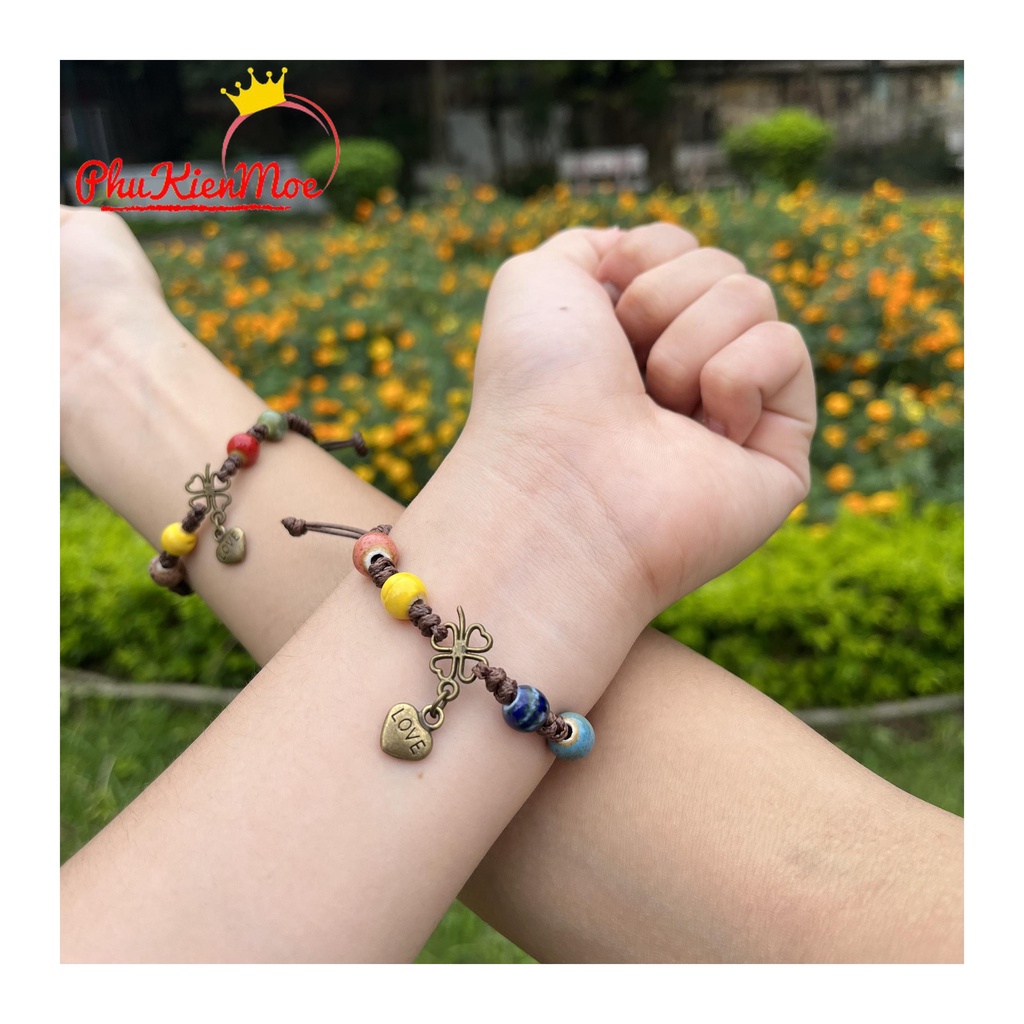 Vòng tay dây rút hạt thổ cẩm hình chiếc lá may mắn gắn tim handmade PhuKienMoe