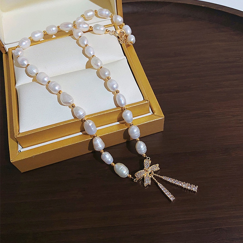 Dây Chuyền Mặt Nơ Đính Ngọc Trai Thời Trang