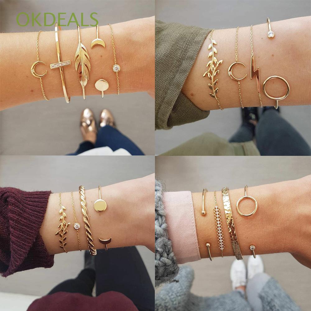 Set 4 vòng đeo tay hợp kim nhiều kiểu dáng thời trang và thanh lịch cho nữ