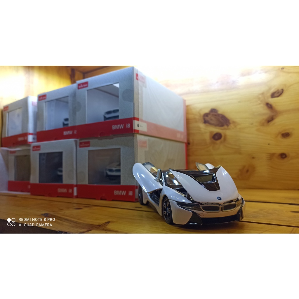 Mô hình xe ô tô siêu xe BMW I8 Hãng Rastar tỉ lệ 1:24 màu trắng, vỏ hợp kim, mở được cửa