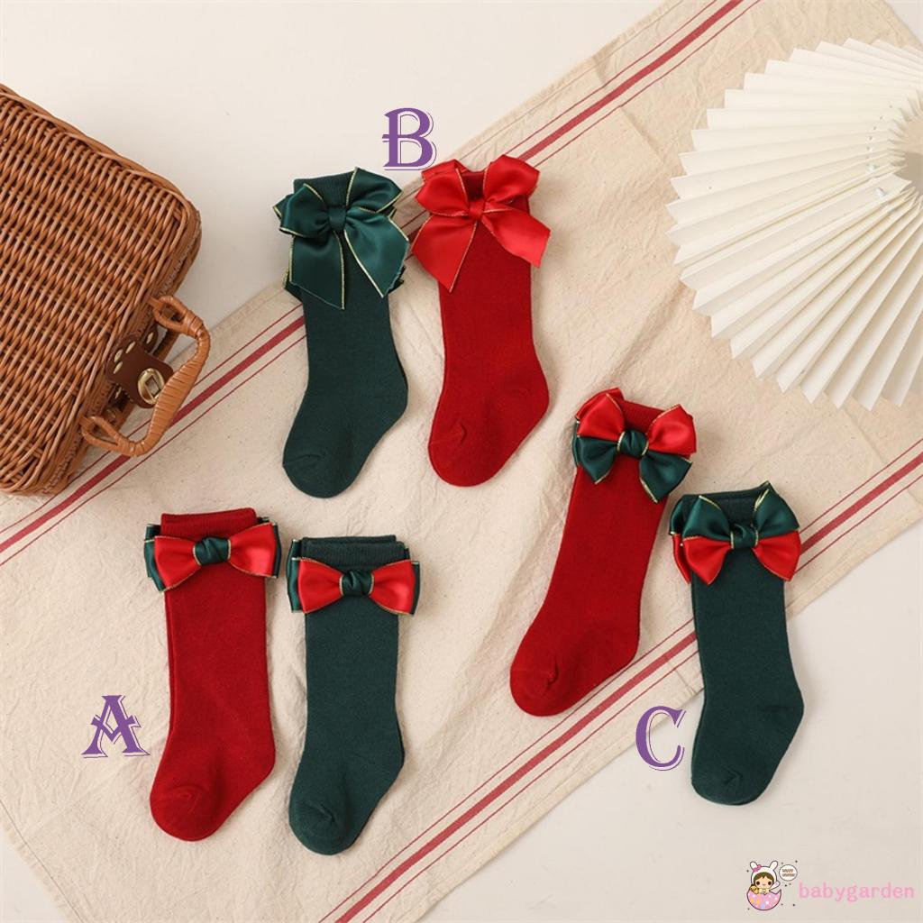 Set 2 đôi vớ dài trung bình đính nơ họa tiết Giáng Sinh dành cho bé gái 0-4 tuổi