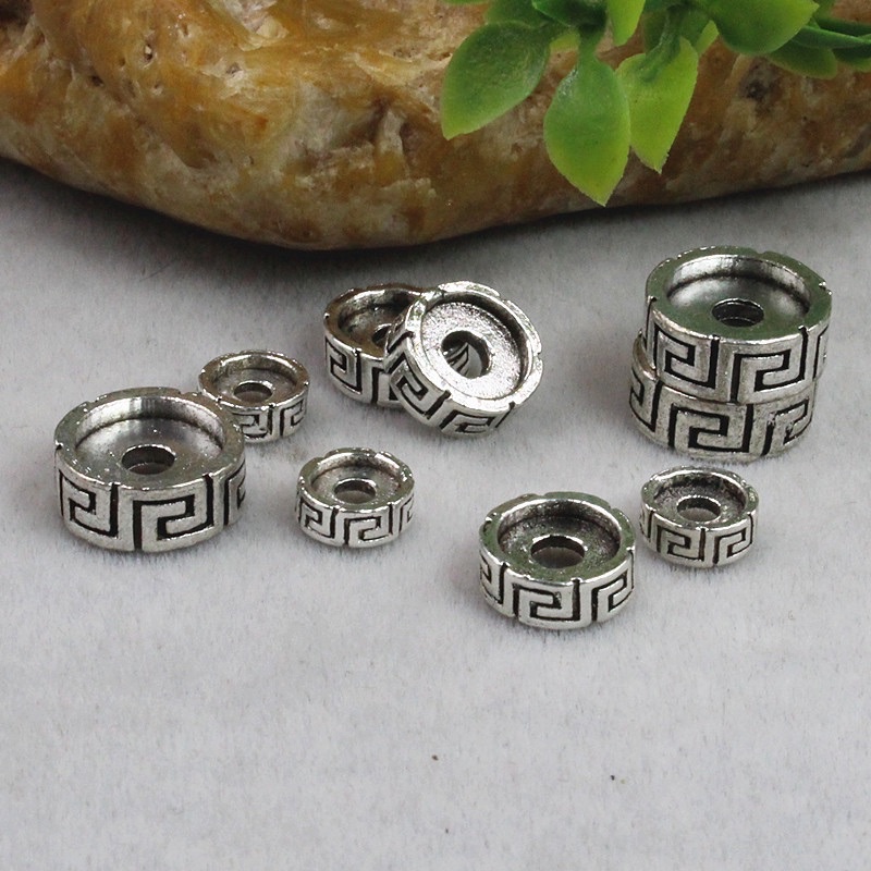 Charm chặn bạc - Hoạ tiết hoa văn