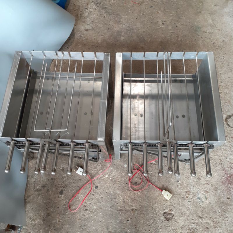 Máy nướng thịt chả quay gà vịt tự động bằng inox 6 xiên