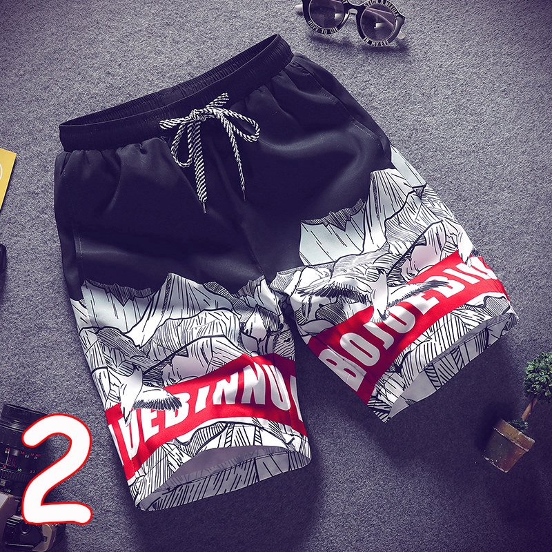 Quần short đi biển dáng rộng nhanh khô họa tiết hoạt hình năng động cho nam | BigBuy360 - bigbuy360.vn