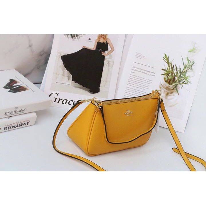 Túi coach mini vàng