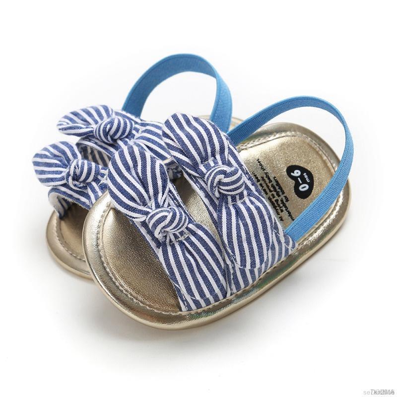 Sandal đính nơ đế mềm chống trượt kiểu dáng thời trang cho bé