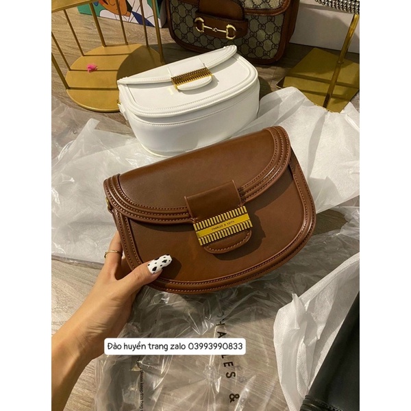 Túi cnk bầu dây bản to đeo chéo,khoá đồng dập logo