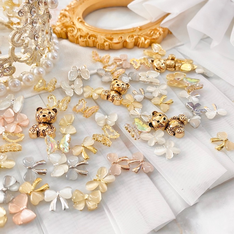 Charm cao cấp - chamr bướm-nơ-gấu gấu 4viên/gói