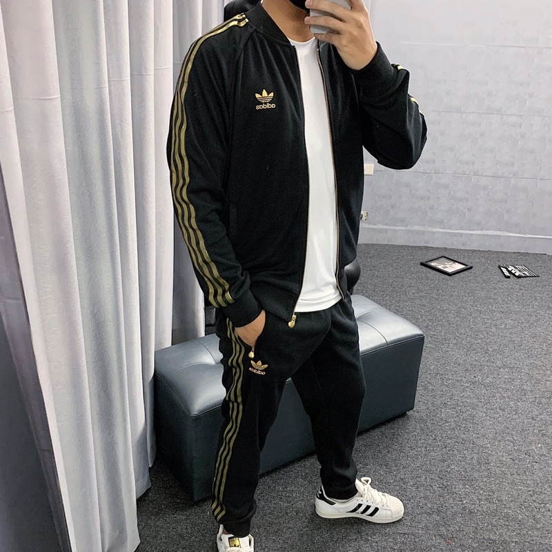 Bộ thể thao đen sọc vàng gold