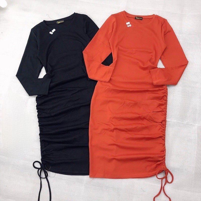 Đầm thun borip tay dài rút dây hông.