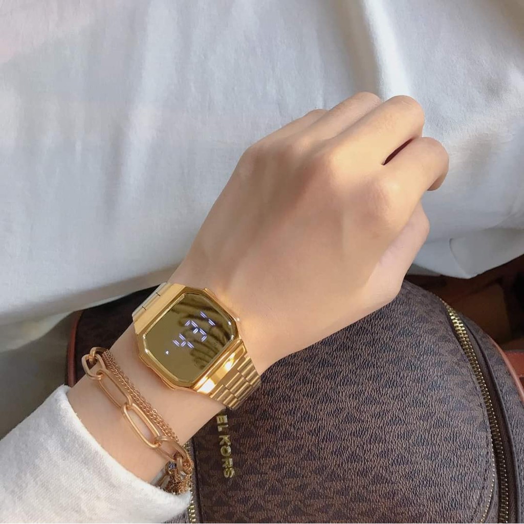 Đồng hồ nữ tráng gương mặt cảm ứng dây thép không gỉ, thiết kế sang trọng hợp thời đại.
