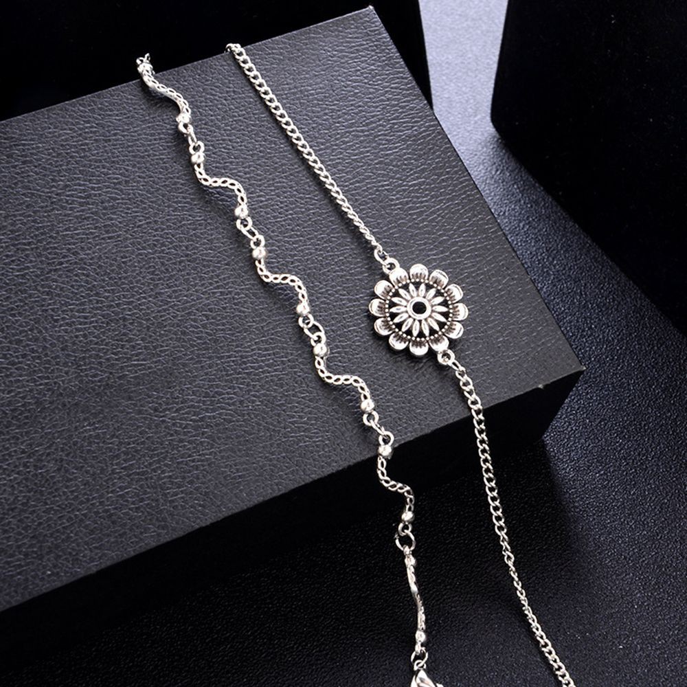 Bộ lắc chân màu bạc dạng gợn sóng thời trang | BigBuy360 - bigbuy360.vn