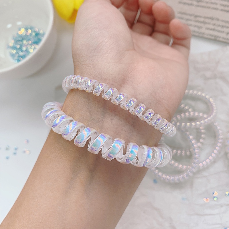 Dây buộc tóc lò xo hologram, chun buộc tóc lò xo nhựa xoắn