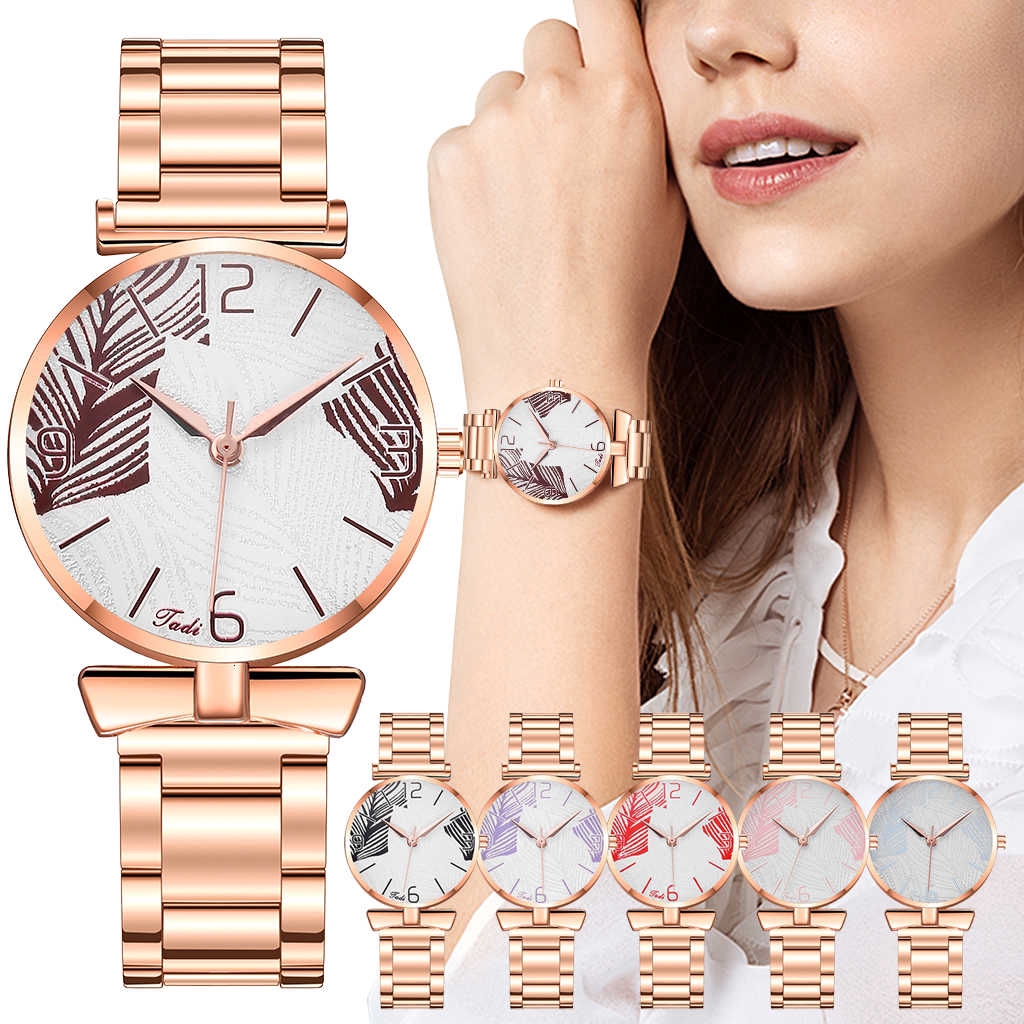 Đồng hồ kim đeo tay bằng thép không gỉ họa tiết chiếc lá dành cho nữ