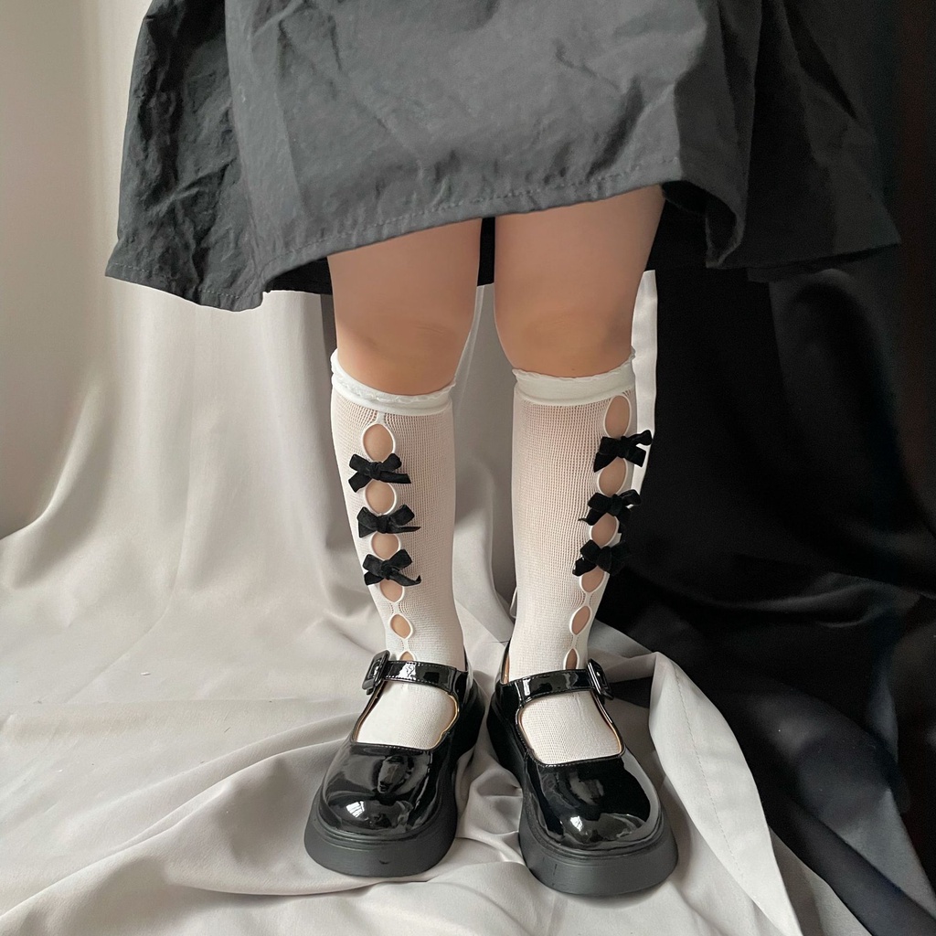 Vớ cao đến gối kiểu cắt rỗng phối nơ phong cách Lolita xinh xắn cho bé gái