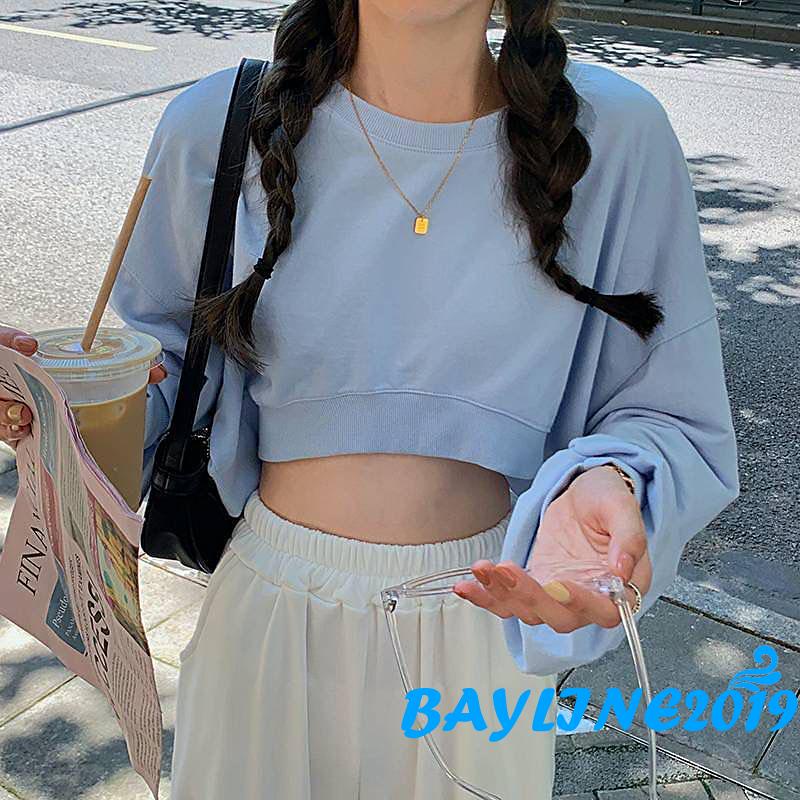 Áo thun dài tay hở rốn cổ tròn màu trơn thời trang năng động cho nữ