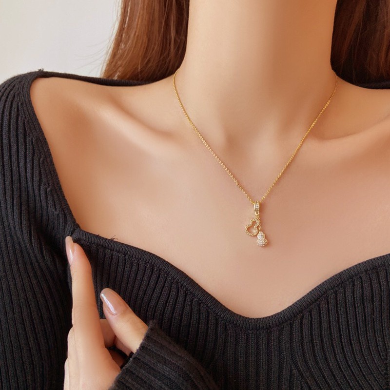 Dây chuyền titan nữ không gỉ mạ vàng 18k, mặt hồ lô may mắn Her Accessories CT320