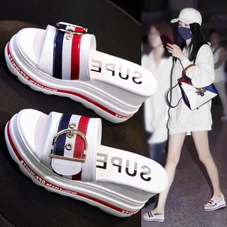 Online celebrity slippers women wear 2021 new slope heels with fashionable thick soles, lazy muffins, sandals and high heels in summer.