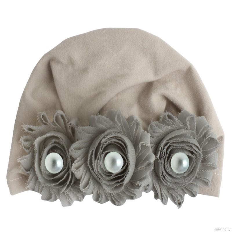 Mũ cotton co dãn đính hoa và ngọc trai cho bé